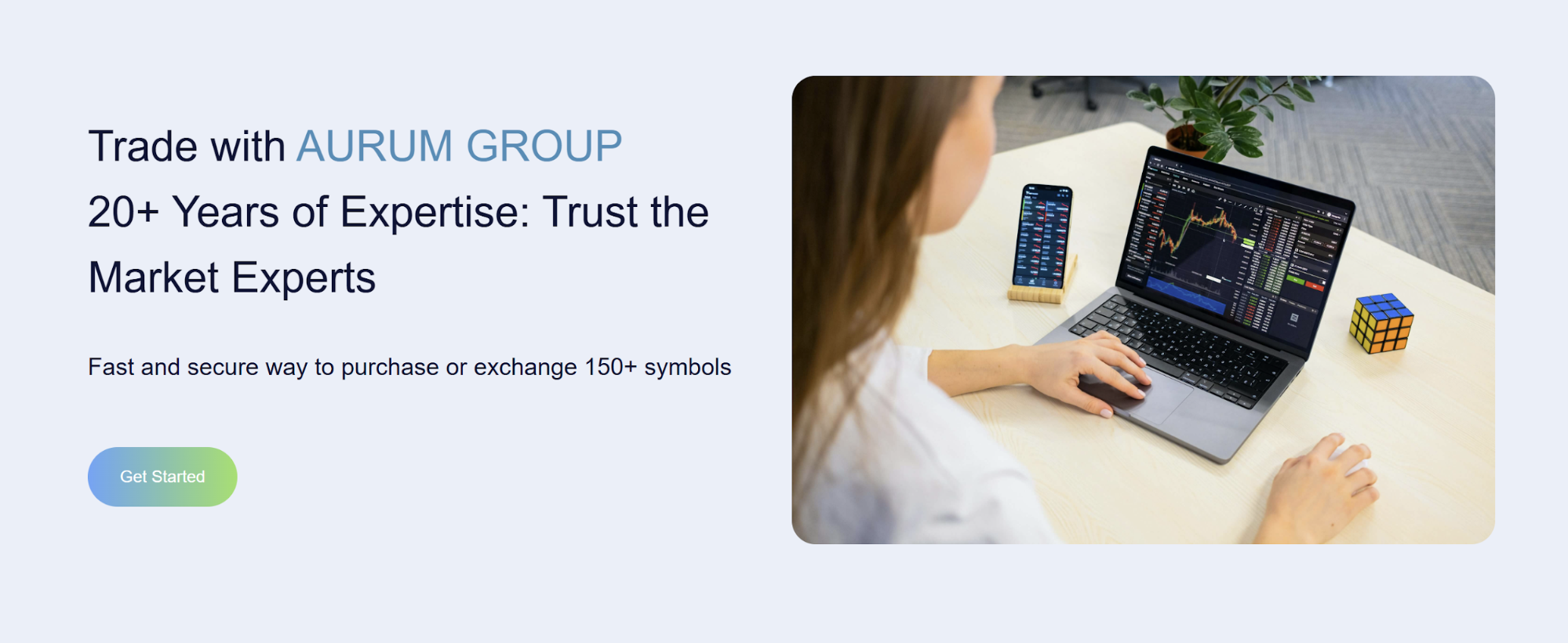 AURUM GROUP homepage showing the trading platform interface and market charts
